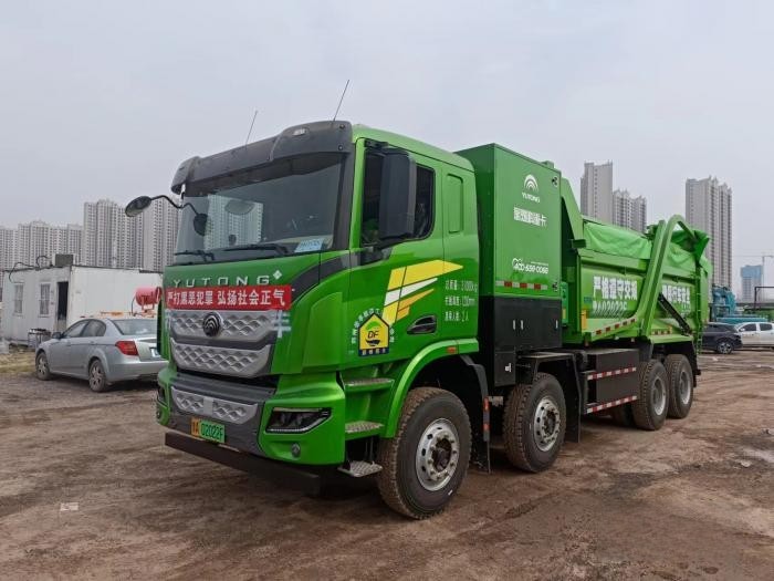 “清一色綠色軍團”,“鐵粉”為啥一次性訂購50臺宇通新能源重卡?